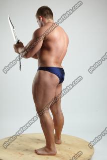 ADAM_WARD STANDING WITH KNIFE